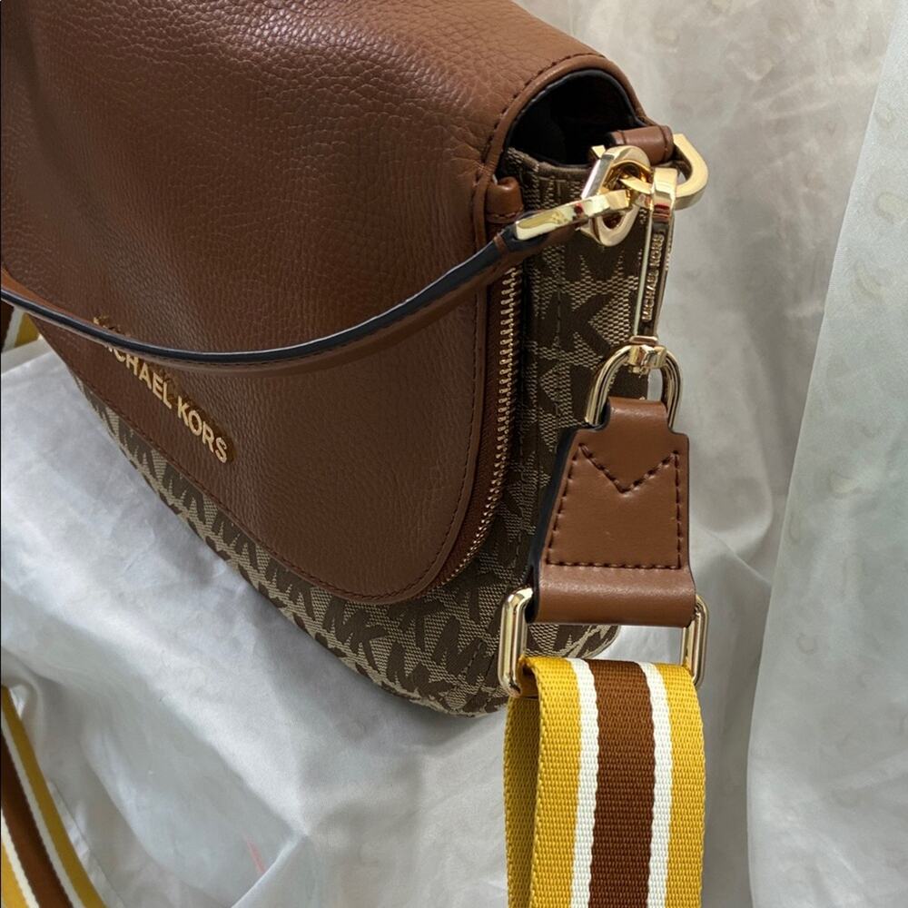 Michael Kors Brown and Tan Messenger Crossbody Bag with thick crossbody strap. - Picture 6 of 11